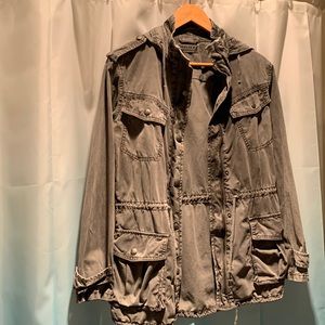 Gray, lightly worn jacket.